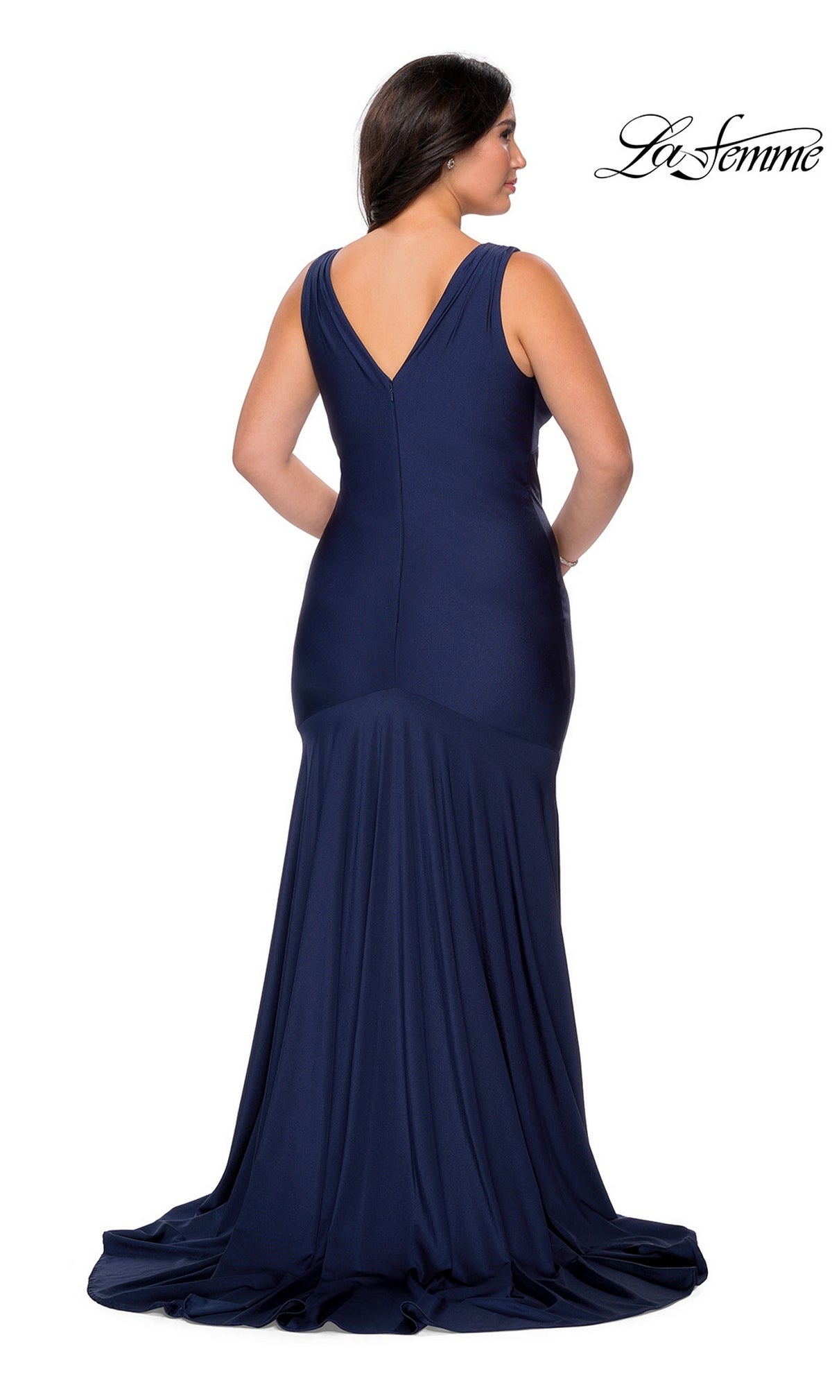 Back view of a woman wearing a La Femme 29016 long plus-size prom dress in a floor-length, sleeveless navy blue mermaid-style jersey.